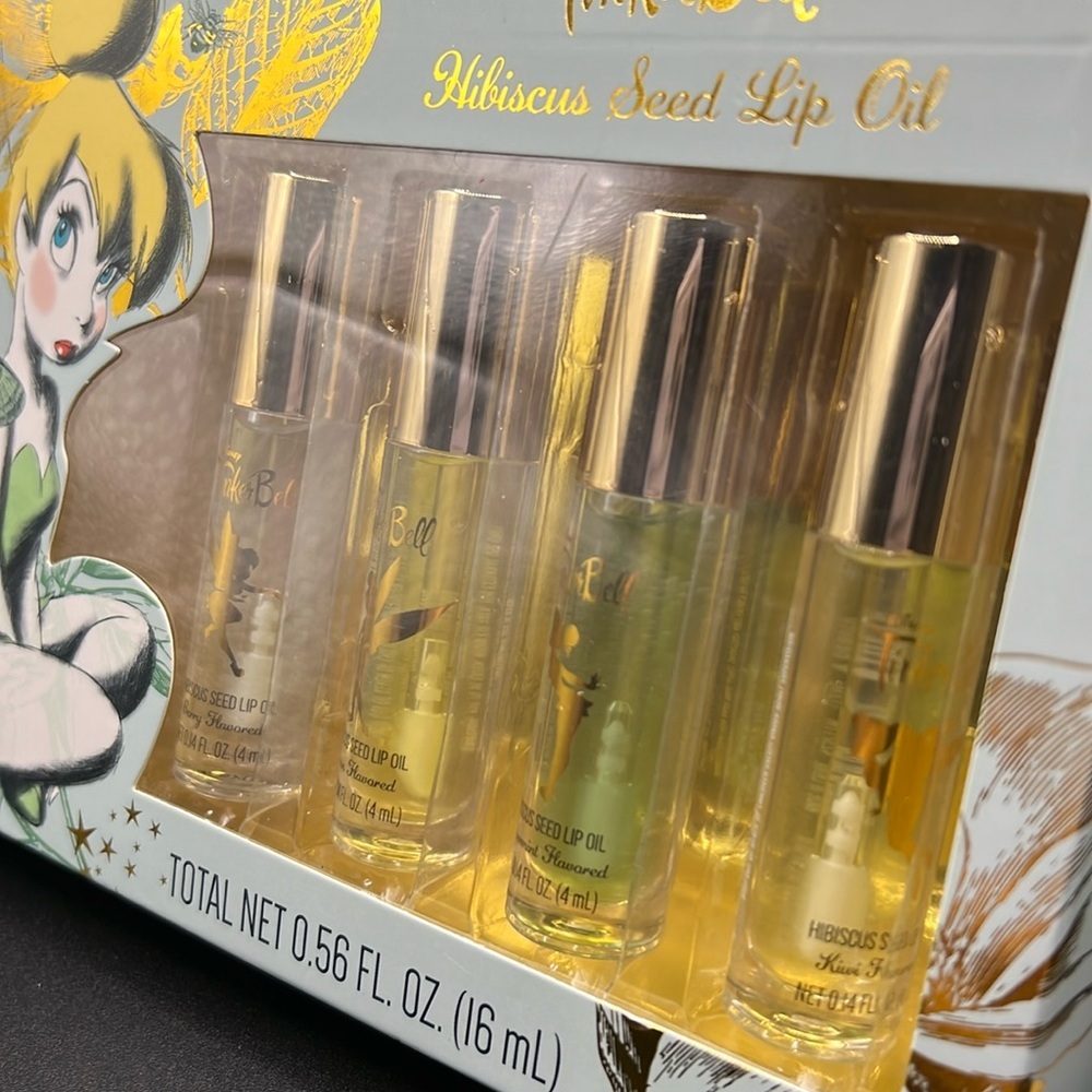 PRICE IS FIRM - Disney Tinkerbell 4 Piece Hibiscus Seed Lip Oil Collection Set - Picture 3 of 4
